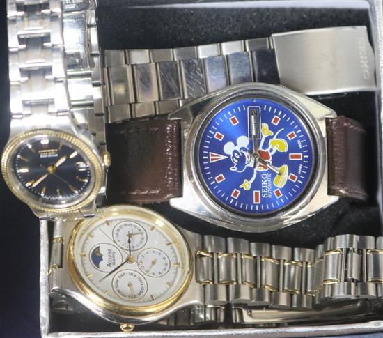 A 1970s Seiko automatic watch, accurist moonface watch and another watch